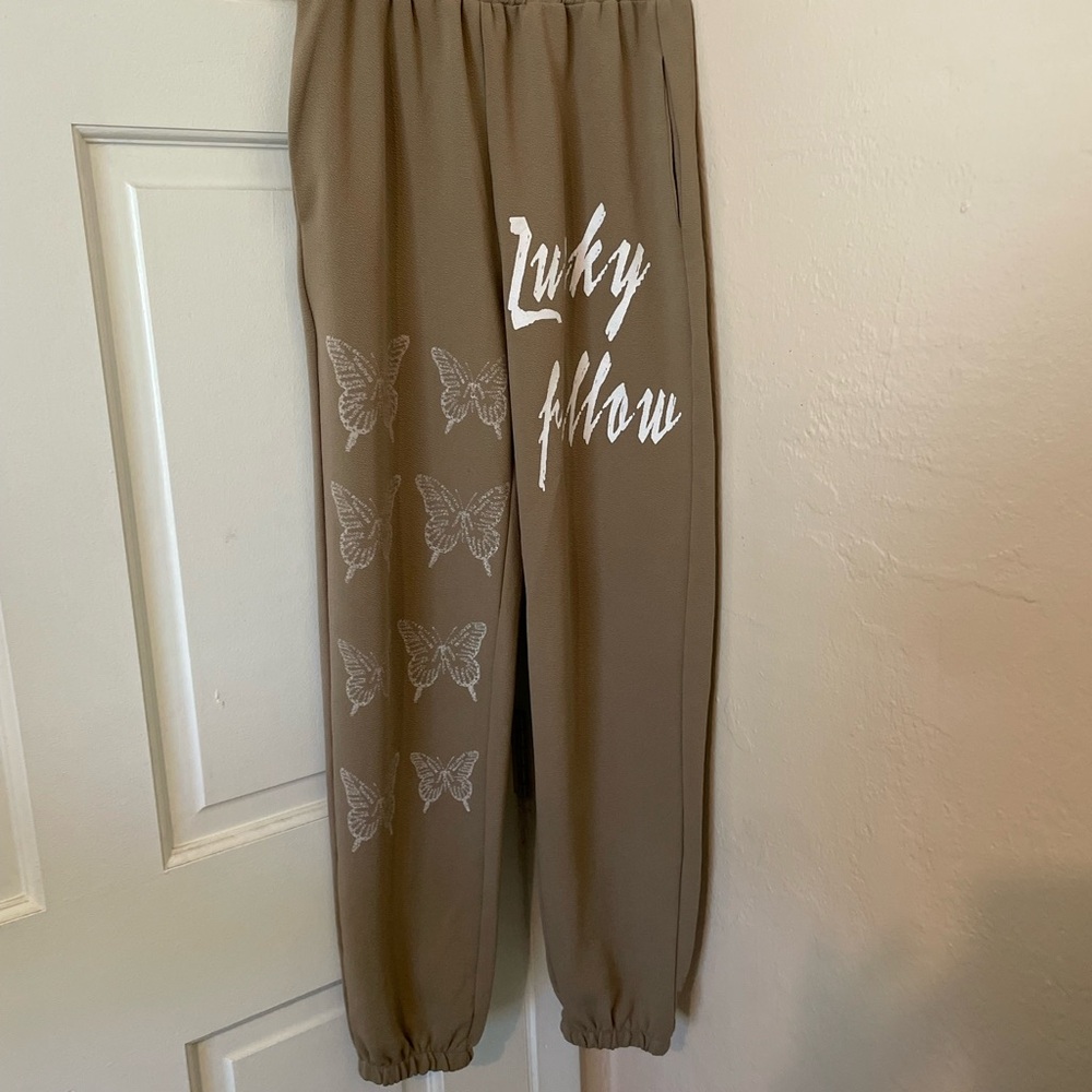 Fashion Nova Taupe Joggers with Butterfly Print